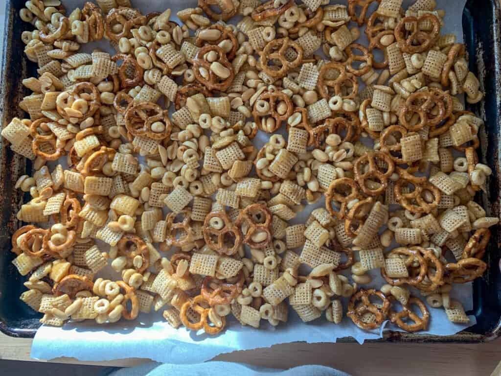Easter snack mix on a baking sheet before going in the oven