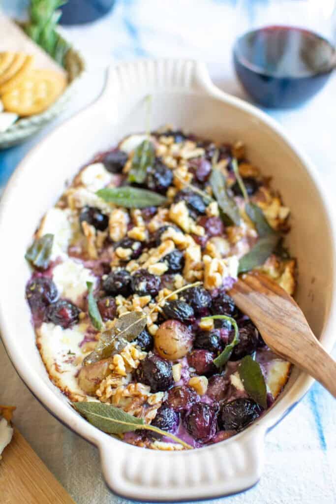 Baked goat cheese with sauteed grapes