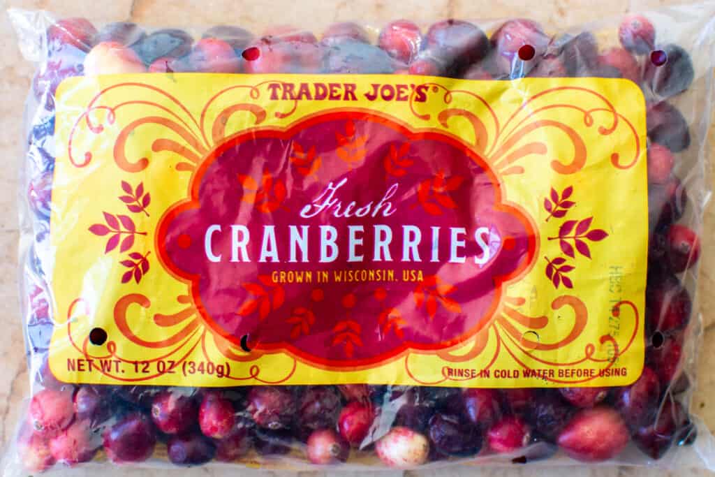 A bag of fresh cranberries 