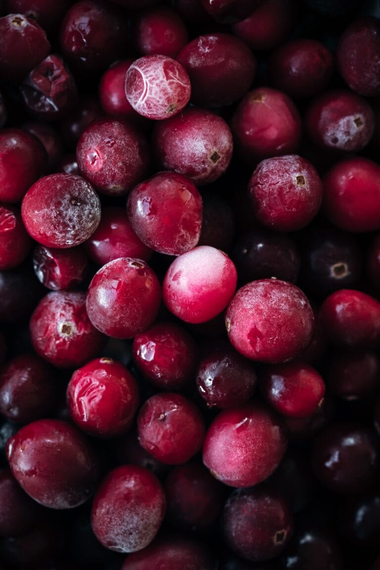 A pile of cranberries close up.