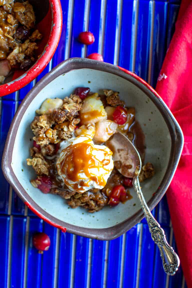 A bowl of gluten free crisp with ice cream on top