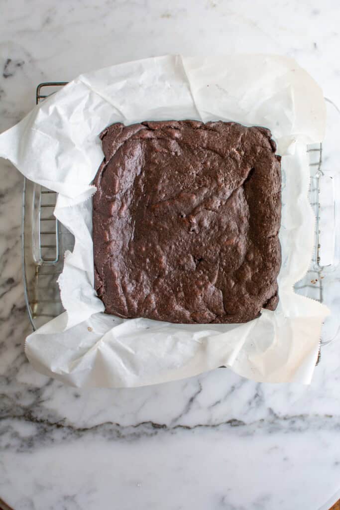 Brownies in a baking pan before being cut 