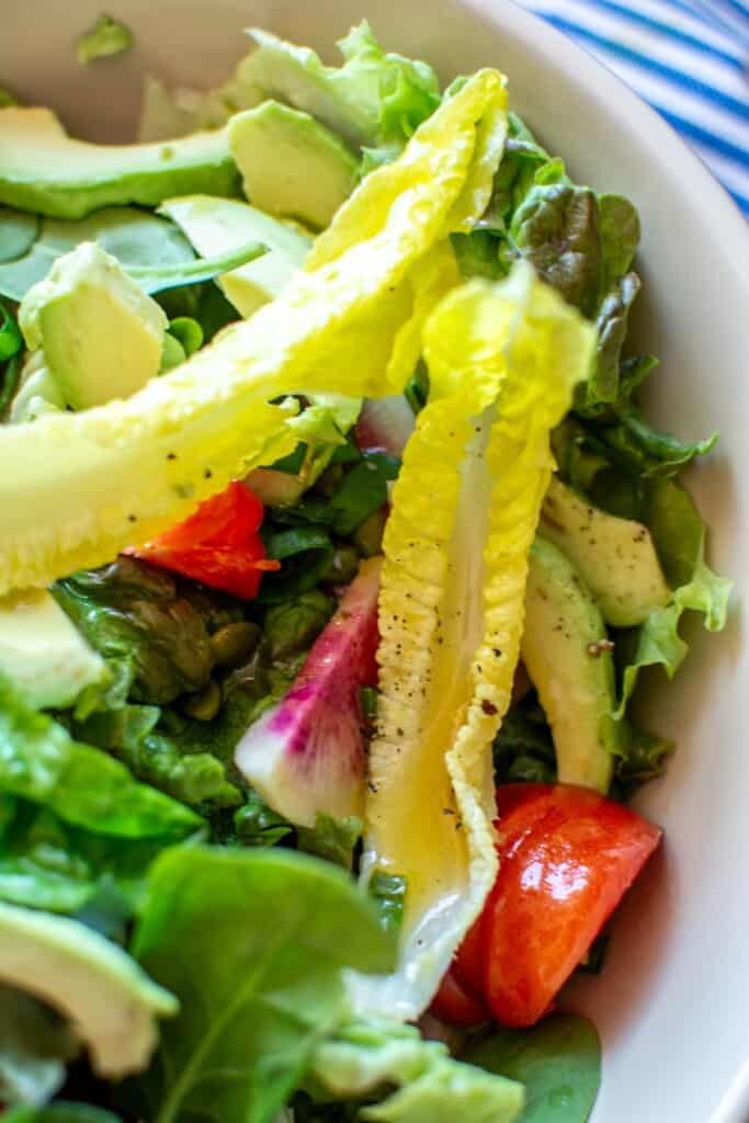 A salad with maple mustard dressing on it. 