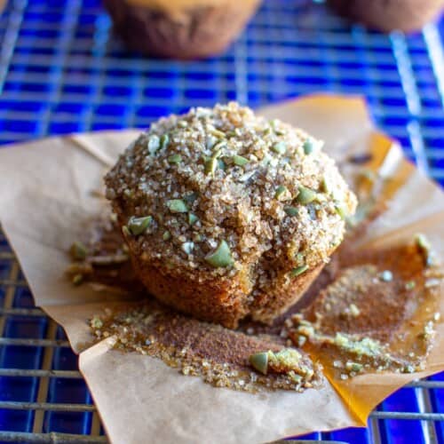 A muffin on a parchment paper wrapper