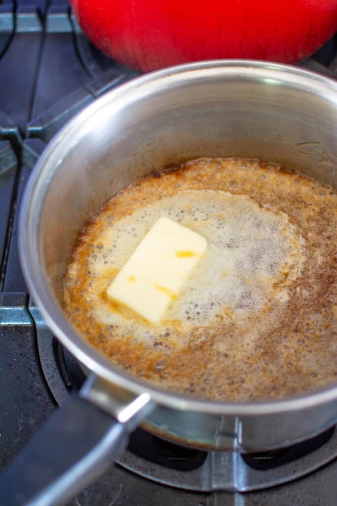 butter melting into caramel sauce