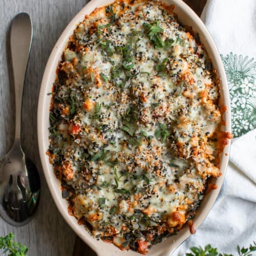 The ground turkey casserole with a spoon next to it