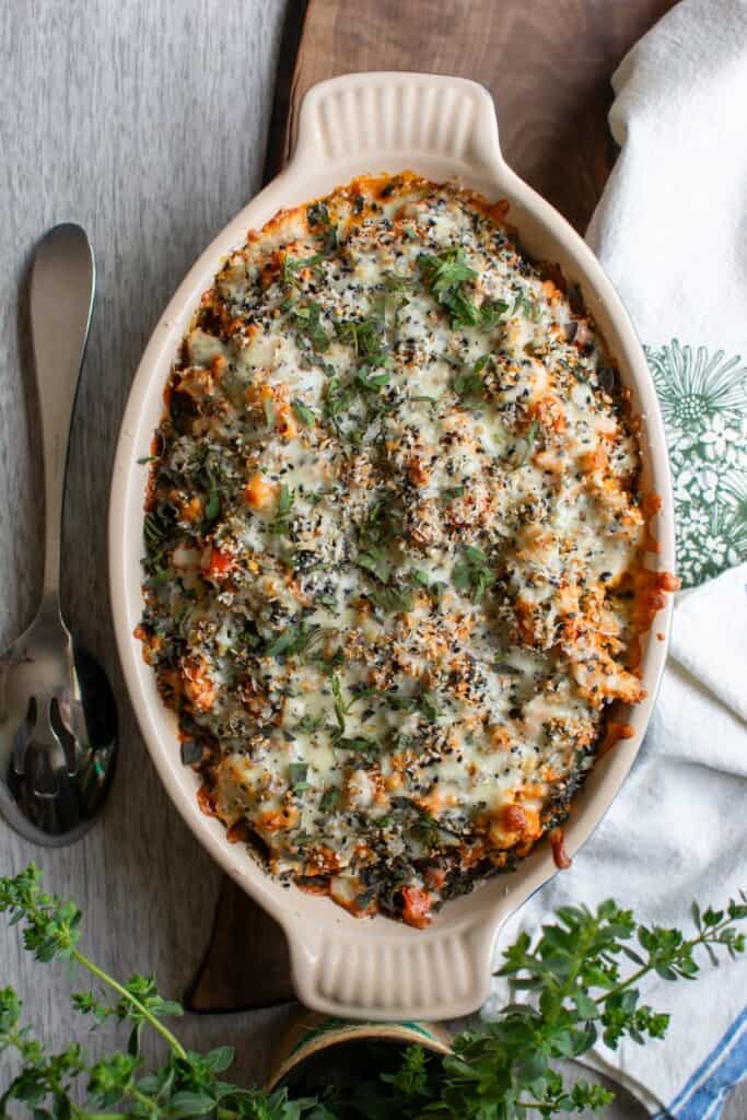 The ground turkey casserole with a spoon next to it