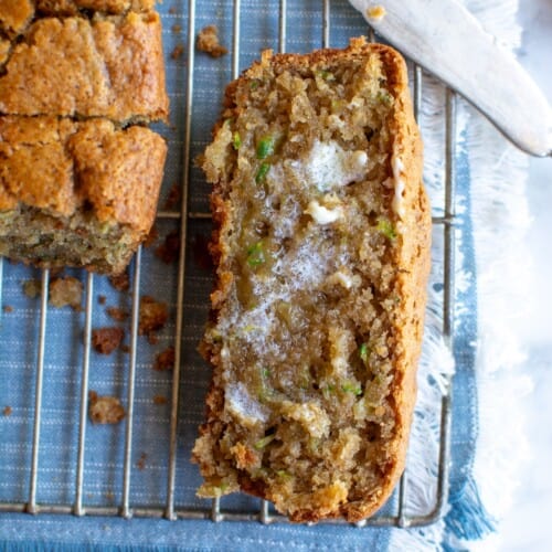 A slice of zucchini bread with butter