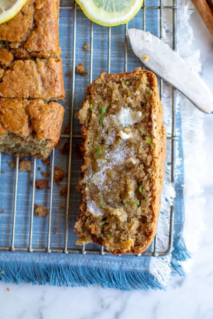 A slice of zucchini bread with butter