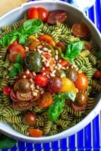 pasta salad with cherry tomatoes on top