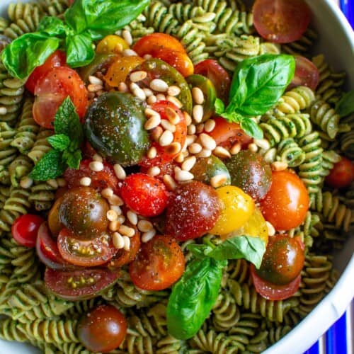 pasta salad with cherry tomatoes on top