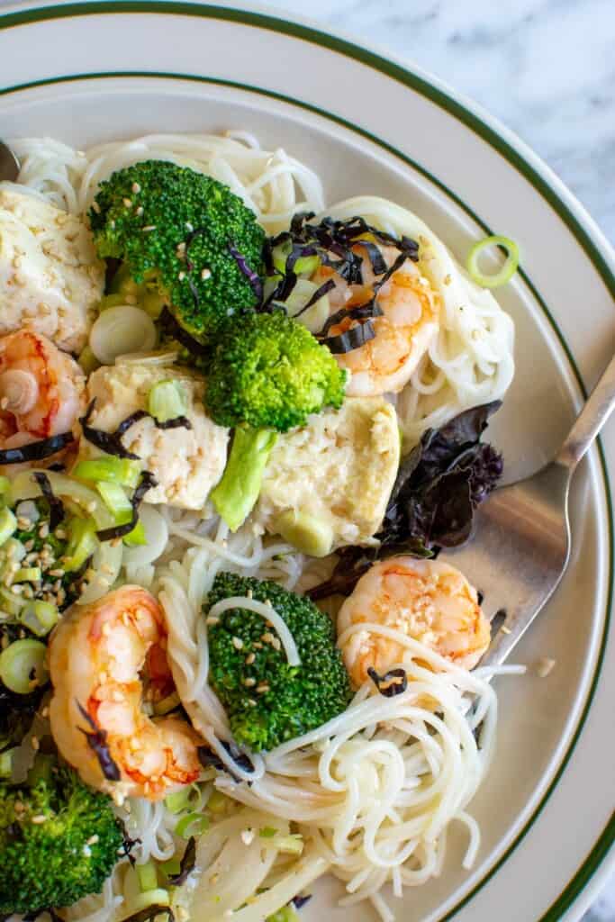 tofu, shrimp, and broccoli over rice noodle
