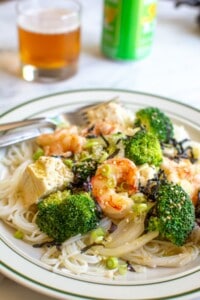 shrimp, tofu, and broccoli over rice noodles