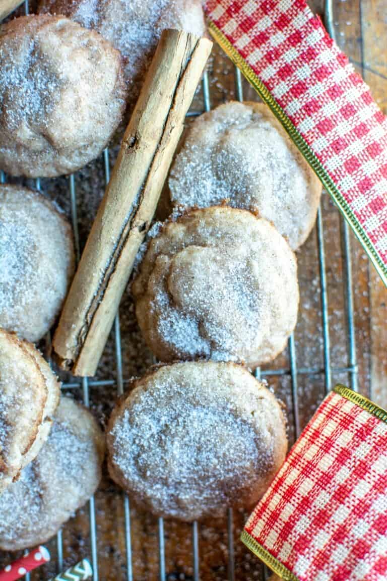 snickerdoodle cookies next to red ribbon