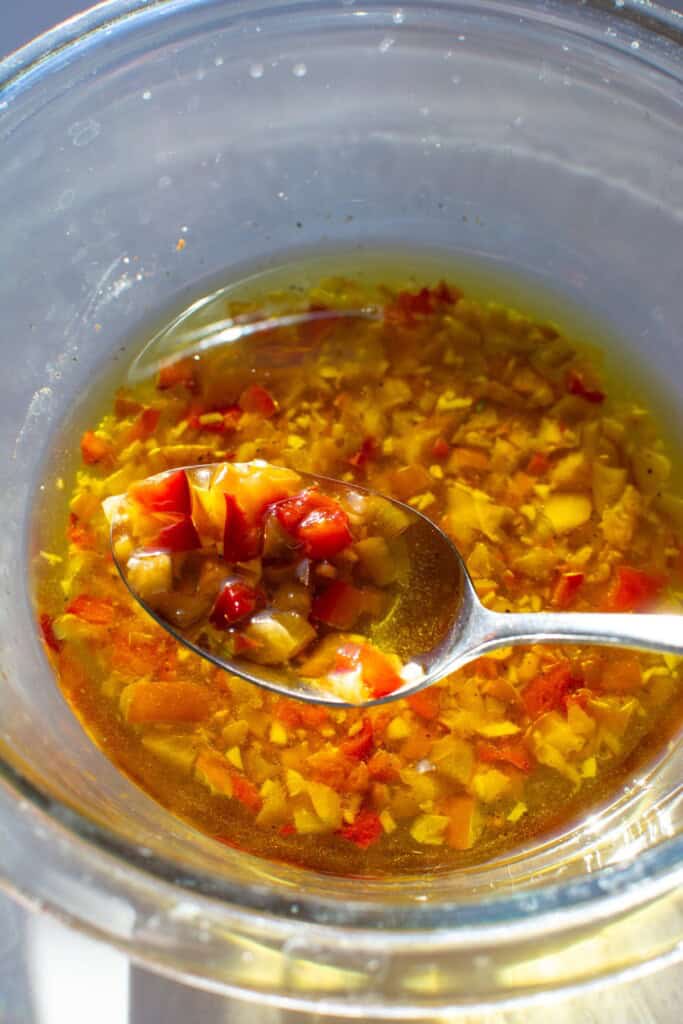 All the dressing ingredients in a bowl.