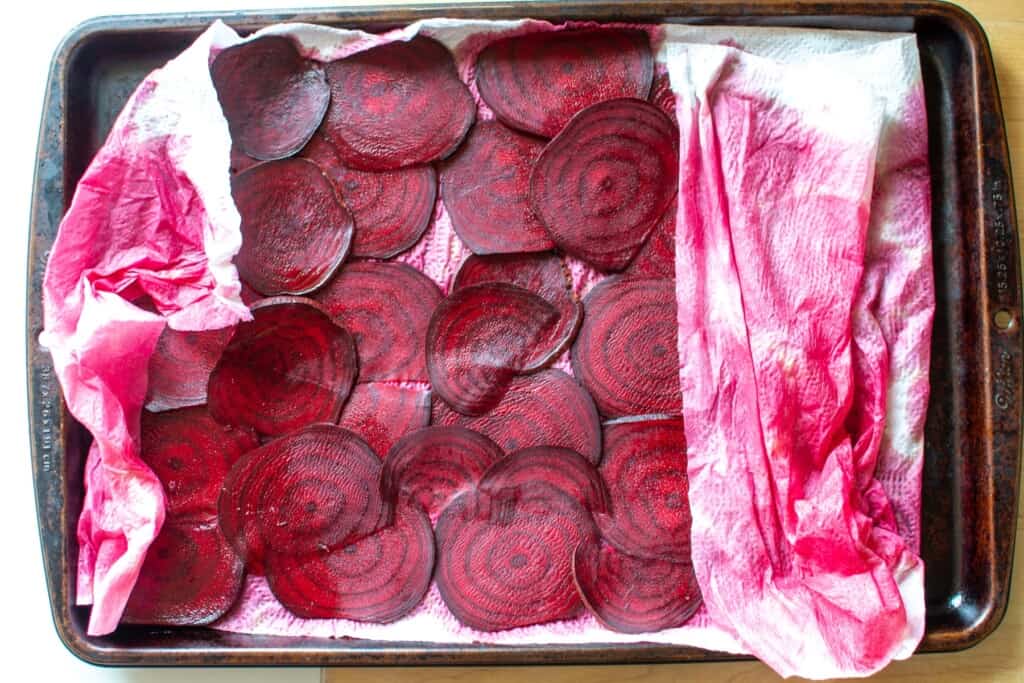 beets on a baking sheet with paper towels