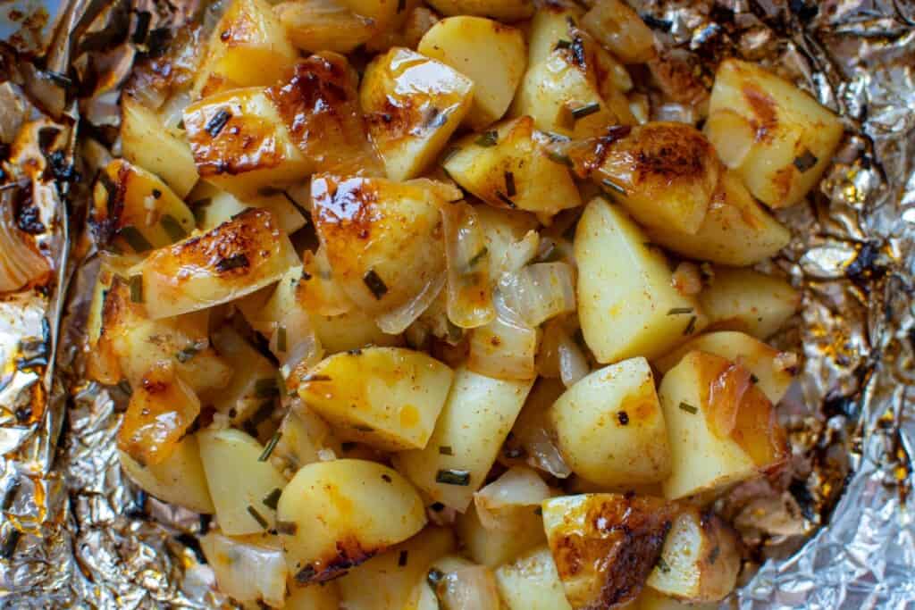 grilled new potatoes on a piece of foil