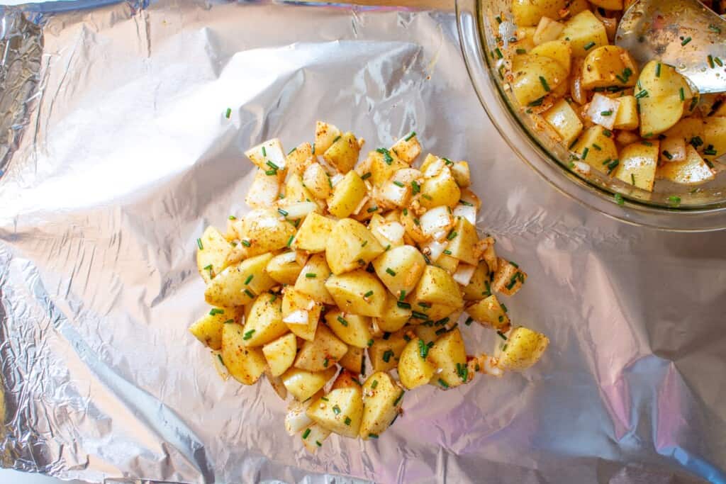 chopped potatoes on a piece of foil