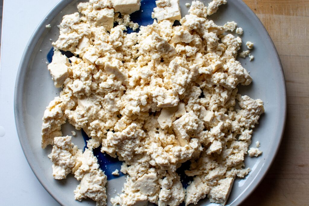 a plate of crumbled tofu