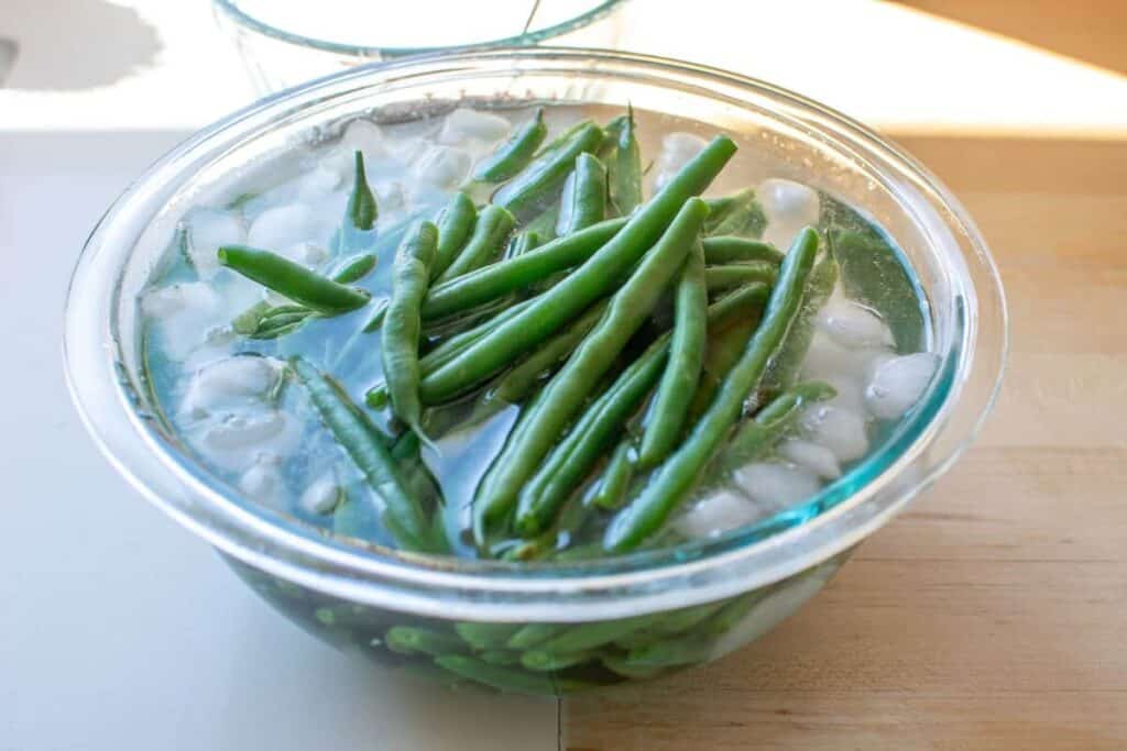 green beans soaked in iced water