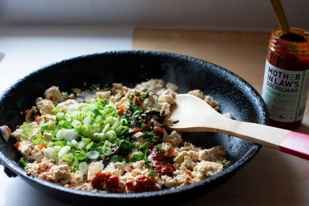 tofu scramble with scallions on top