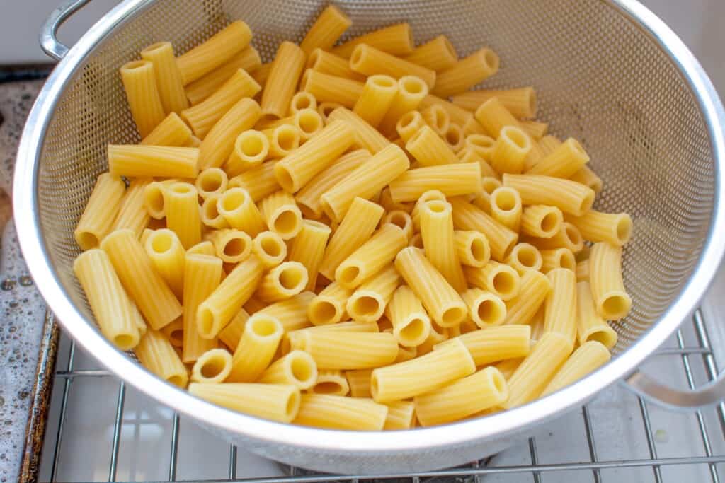 pasta in a colander in the sink