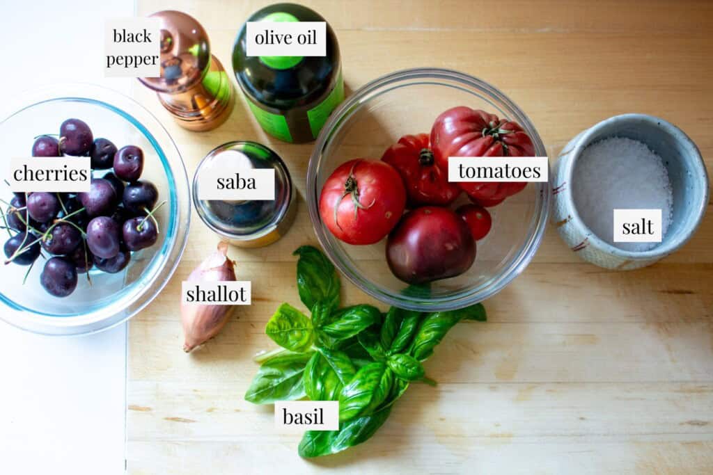 All the ingredients to make a cherry and tomato salad