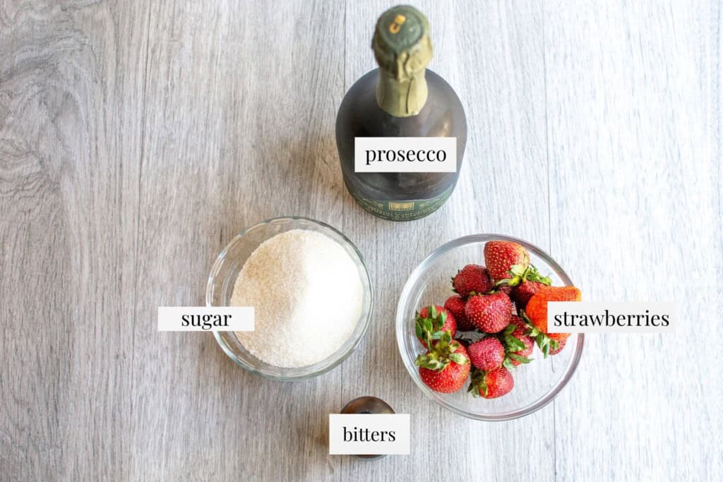 All the ingredients to make a strawberry prosecco cocktail