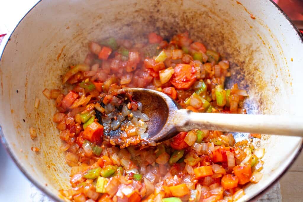 vegetables with tomato paste in a pot