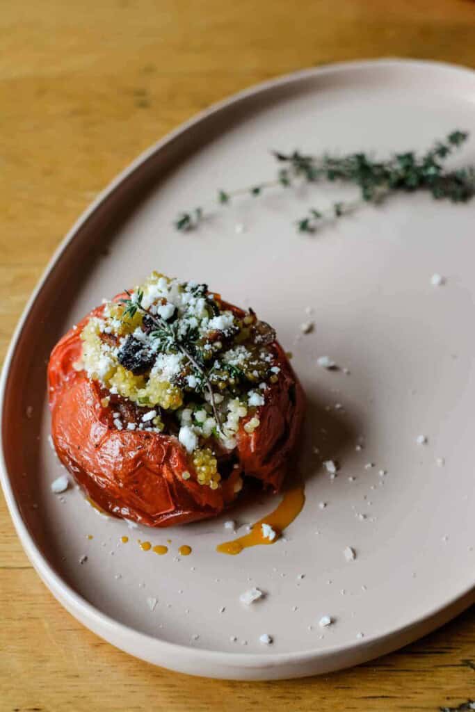 orzo stuffed vegetables in a dish