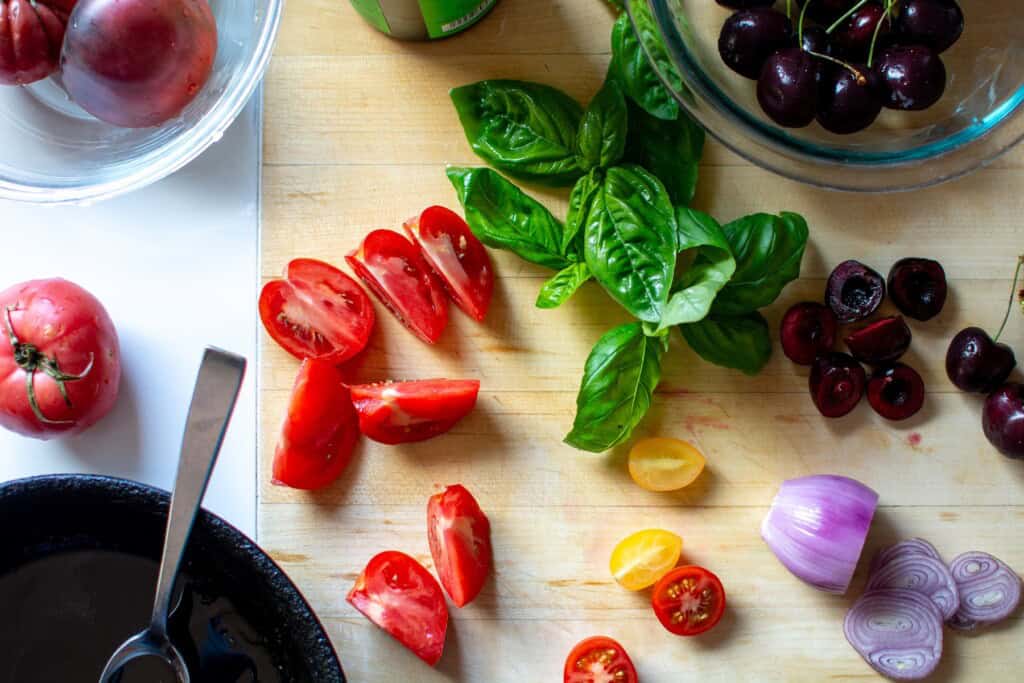 The ingredients to make the salad being cut