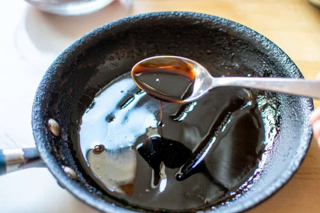 balsamic reduced in a black frying pan