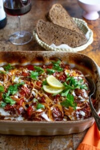 a baking dish with eggplant in it