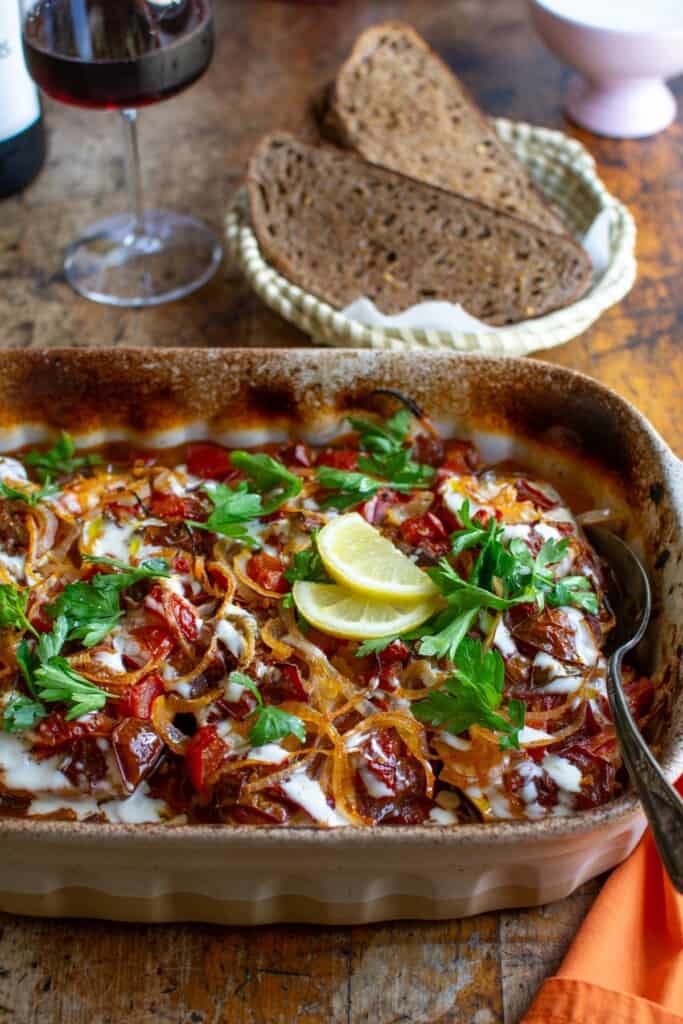 a baking dish with eggplant in it