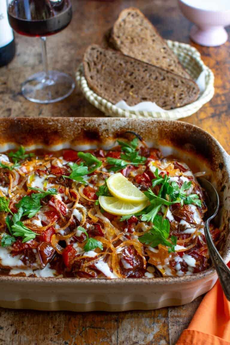 a baking dish with eggplant in it