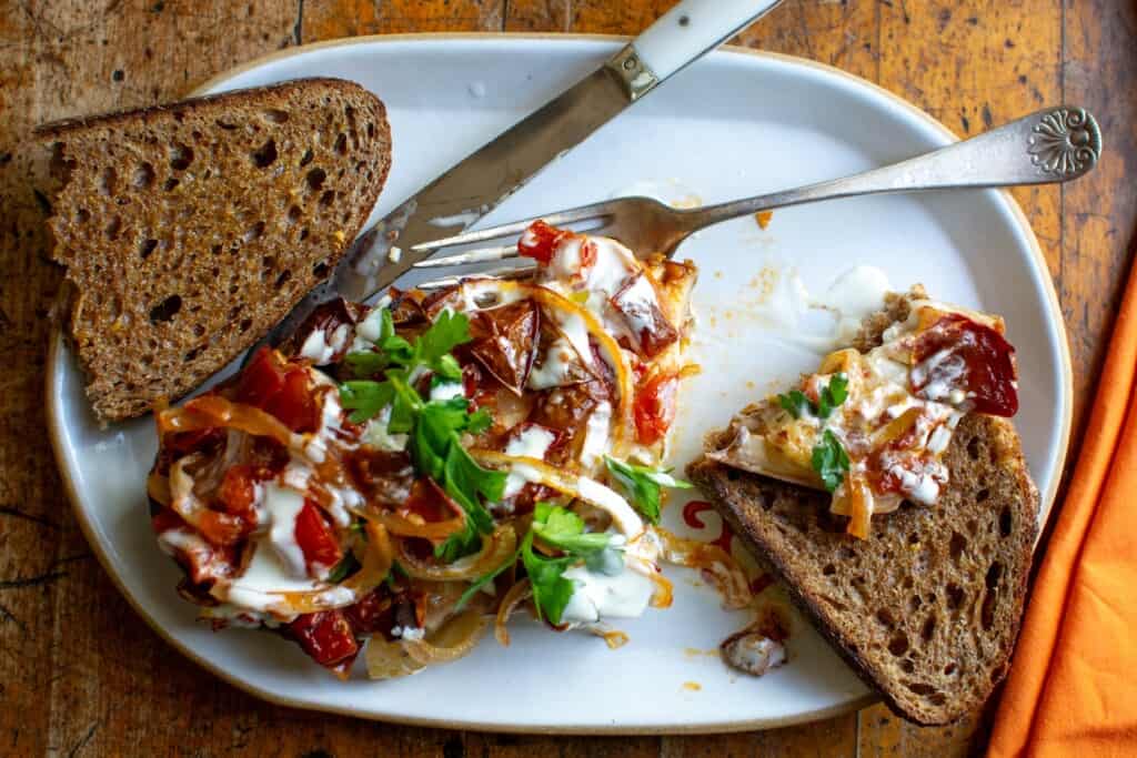 eggplant with a slice of bread next to it. 