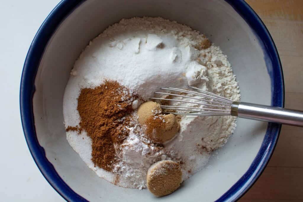 all the dry ingredients in a bowl with a whisk