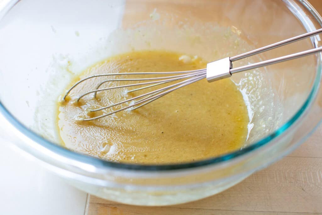 The kale salad dressing in a bowl 