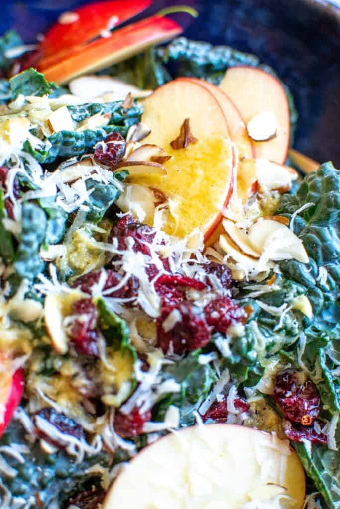 mustard salad dressing on a kale salad