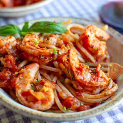 shrimp in tomato sauce in a ceramic bowl