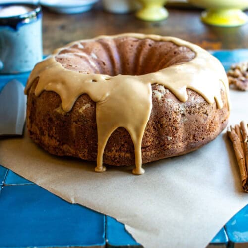 a cinnamon walnut coffee cake on a parchment paper